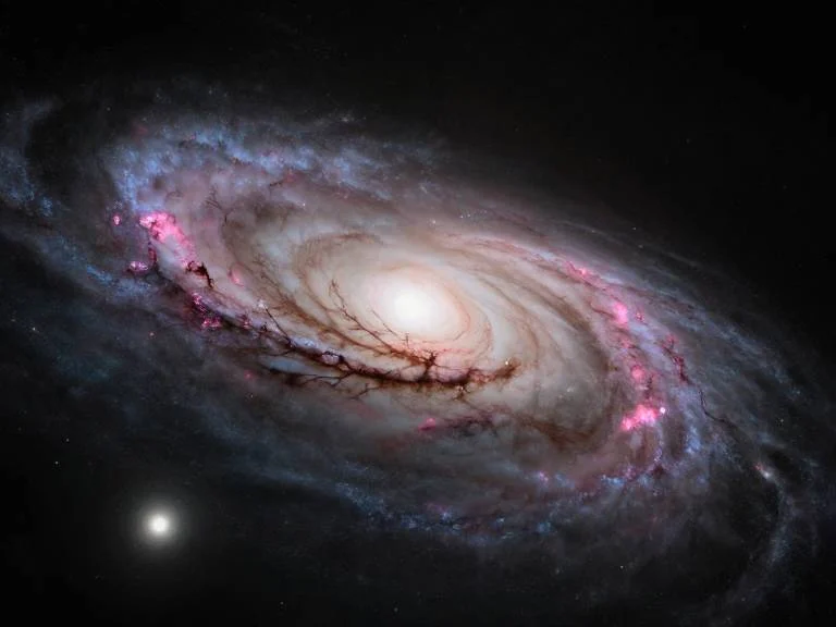 Как телескоп Хаббл заглянул в край спиральной галактики NGC 1827?